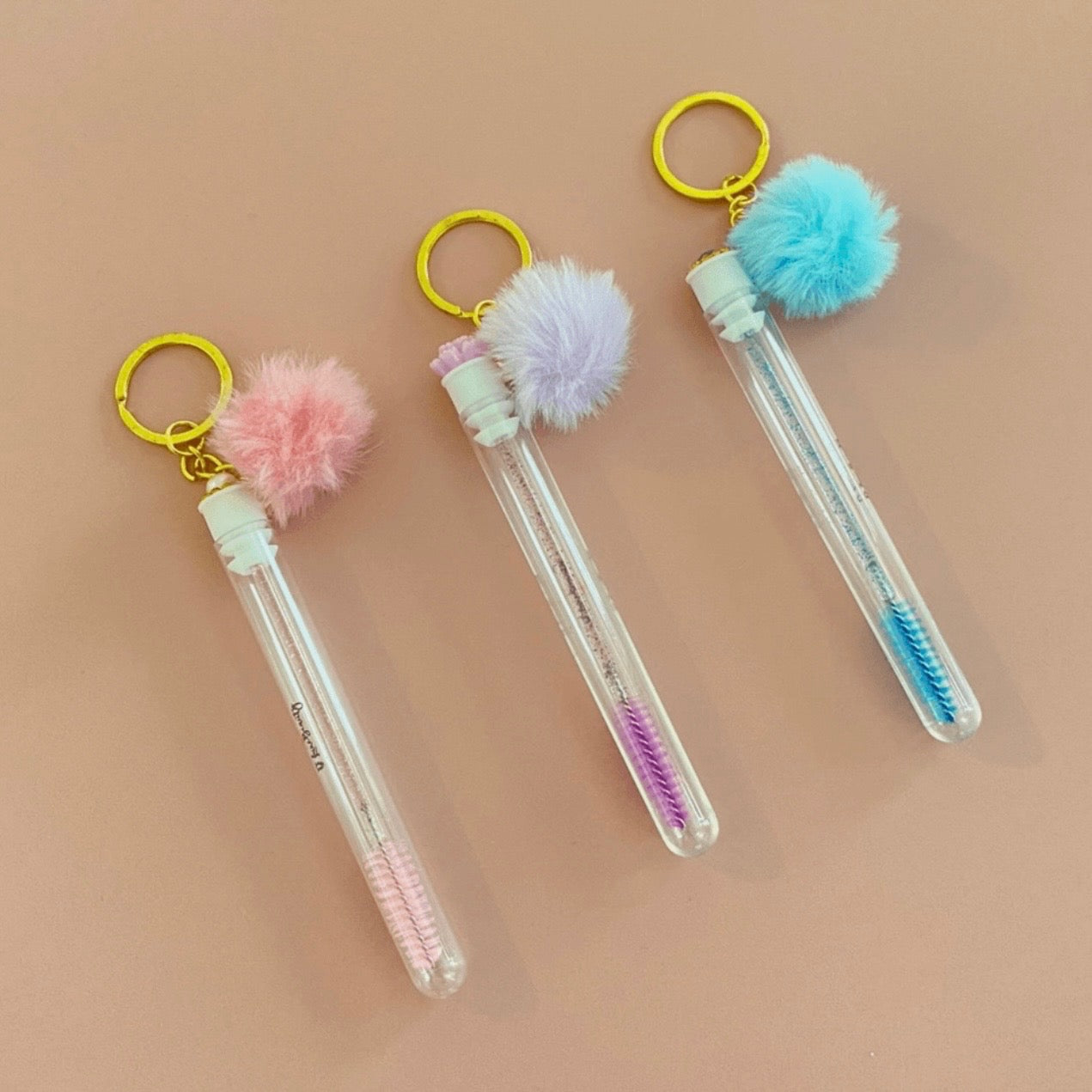 Pom Pom Spoolie Keychains – Big Bank Lashes